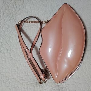 Aldo Pink Shoulder Bag with Gold Accents and Unique Shape